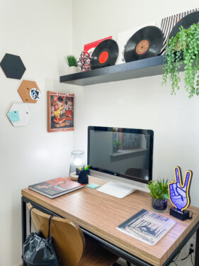 Desk with a large computer monitor